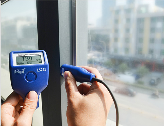 LS221 Coating Thickness Gauge tests the coating on aluminum window sill
