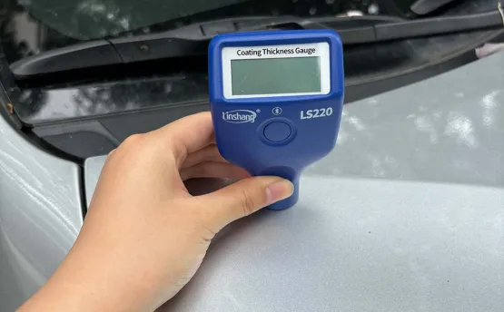 Why do the test results of a used car paint meter show negative numbers? 